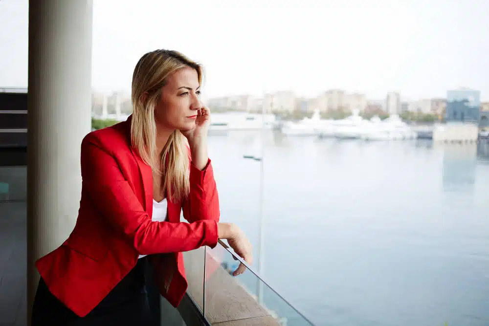 depressed business woman wealth meadowglade