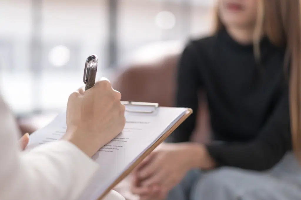 woman speaking to her psychiatrist about lexapro withdrawal timeline