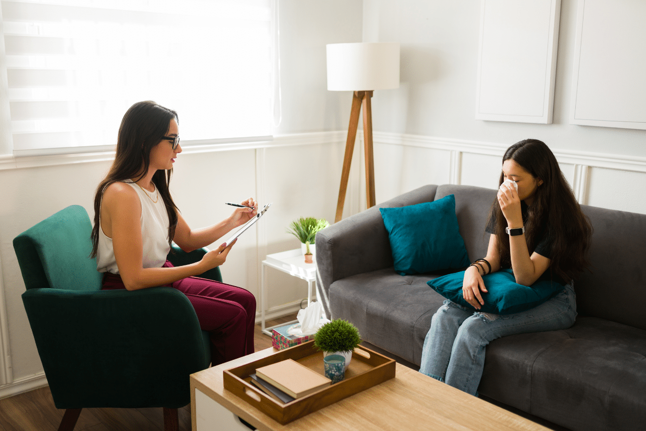 patient speaking to her therapist about releasing inner childhood anxieties