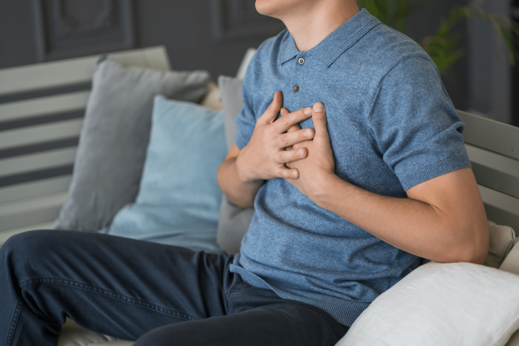 man struggling having silent panic attacks