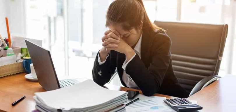 Woman at Desk - Mental Health - Meadowglade|Group Session - Mental Health - Meadowglade